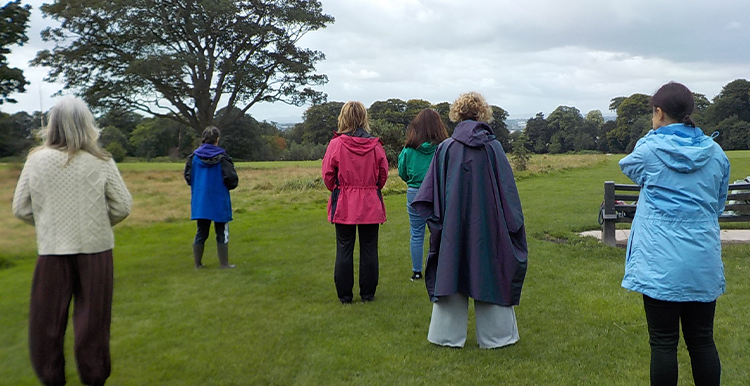 Group taking part in Qi Gong run by Growing Sudley