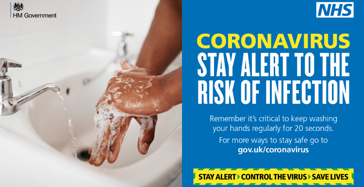 Hands washing over a sink with soap - Coronavirus stay alert to the risk of infection