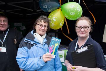 Healthwatch volunteer speaking to the public