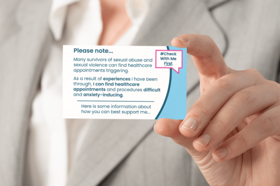 woman holding check with me first card